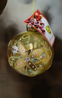 Vianočná guľa zlatá priehľadná - zlatý kvet D7cm